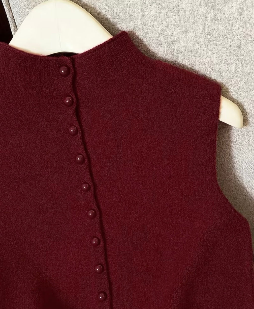 STRICKWESTE MIT KNOPFLEISTE