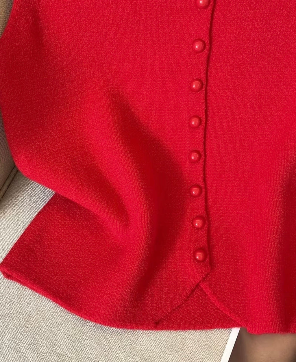 STRICKWESTE MIT KNOPFLEISTE