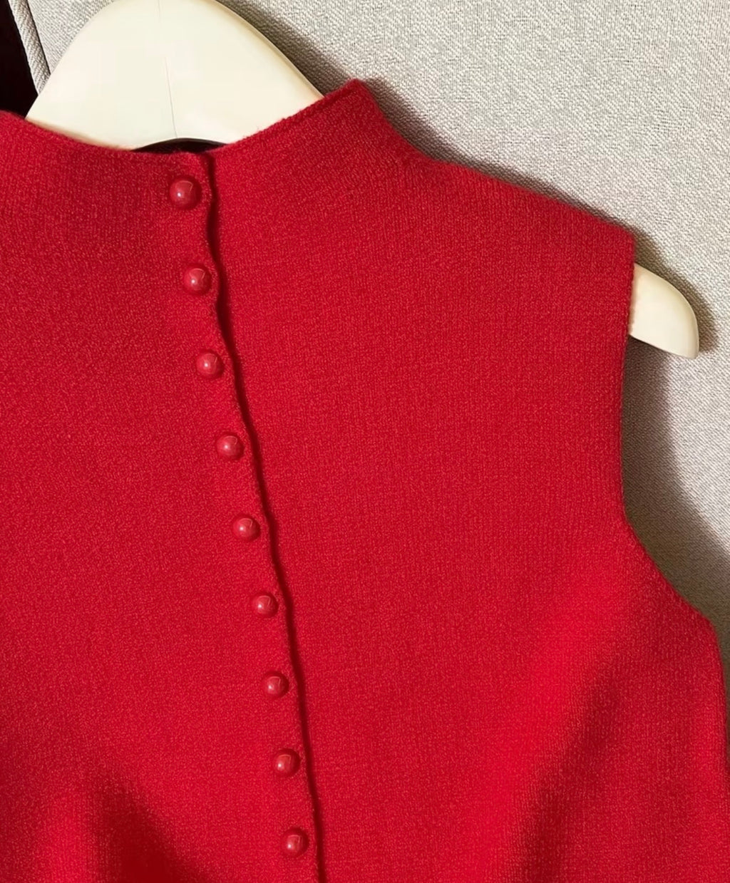 STRICKWESTE MIT KNOPFLEISTE